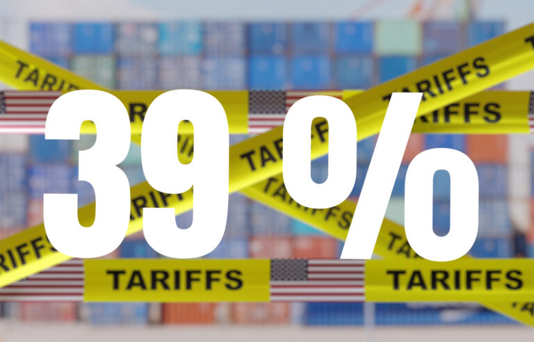 Schweizer-Handelspolitik-Doppelstrategie-gegen-US-Zoelle-. Die Prozentzahl 39 steht vor Absperrbändern, welche mit "Tariffs" und der US-Flagge beschriftet sind.